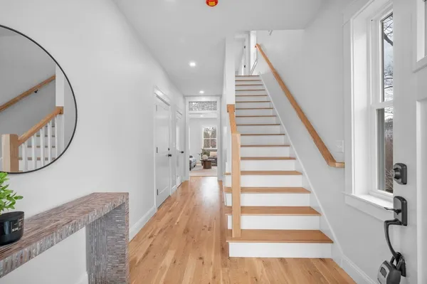 a view of entryway with wooden floor