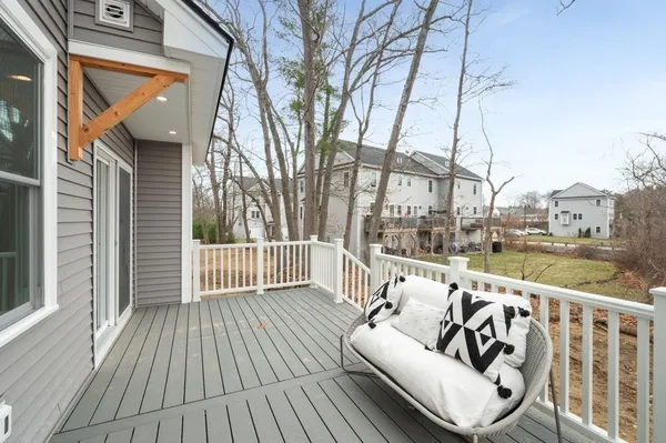 a balcony with hardwood