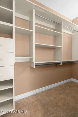 a view of an empty room with empty racks