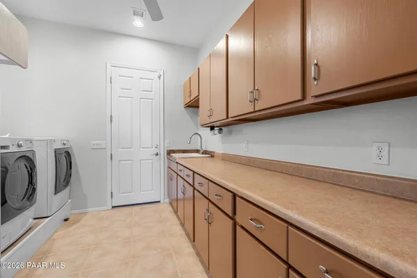 a view of a kitchen with cabinets