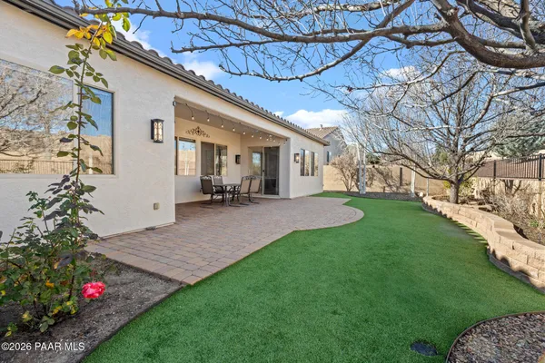 a view of a backyard with a garden