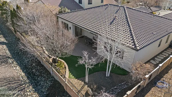 a backyard of a house with lots of green space