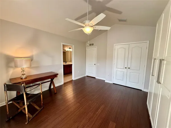 a view of a livingroom with furniture and wooden floor
