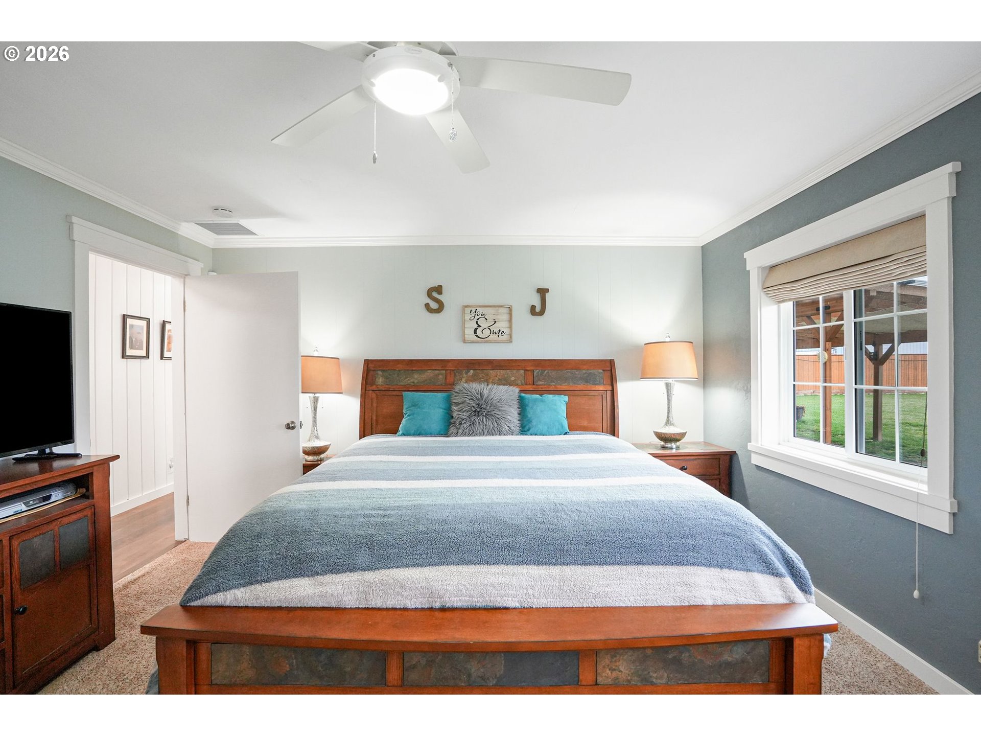 30596 Horseshoe Drive Southwest Albany, OR 97321 - Photo 18 of 43 a bedroom with a bed and a flat screen tv