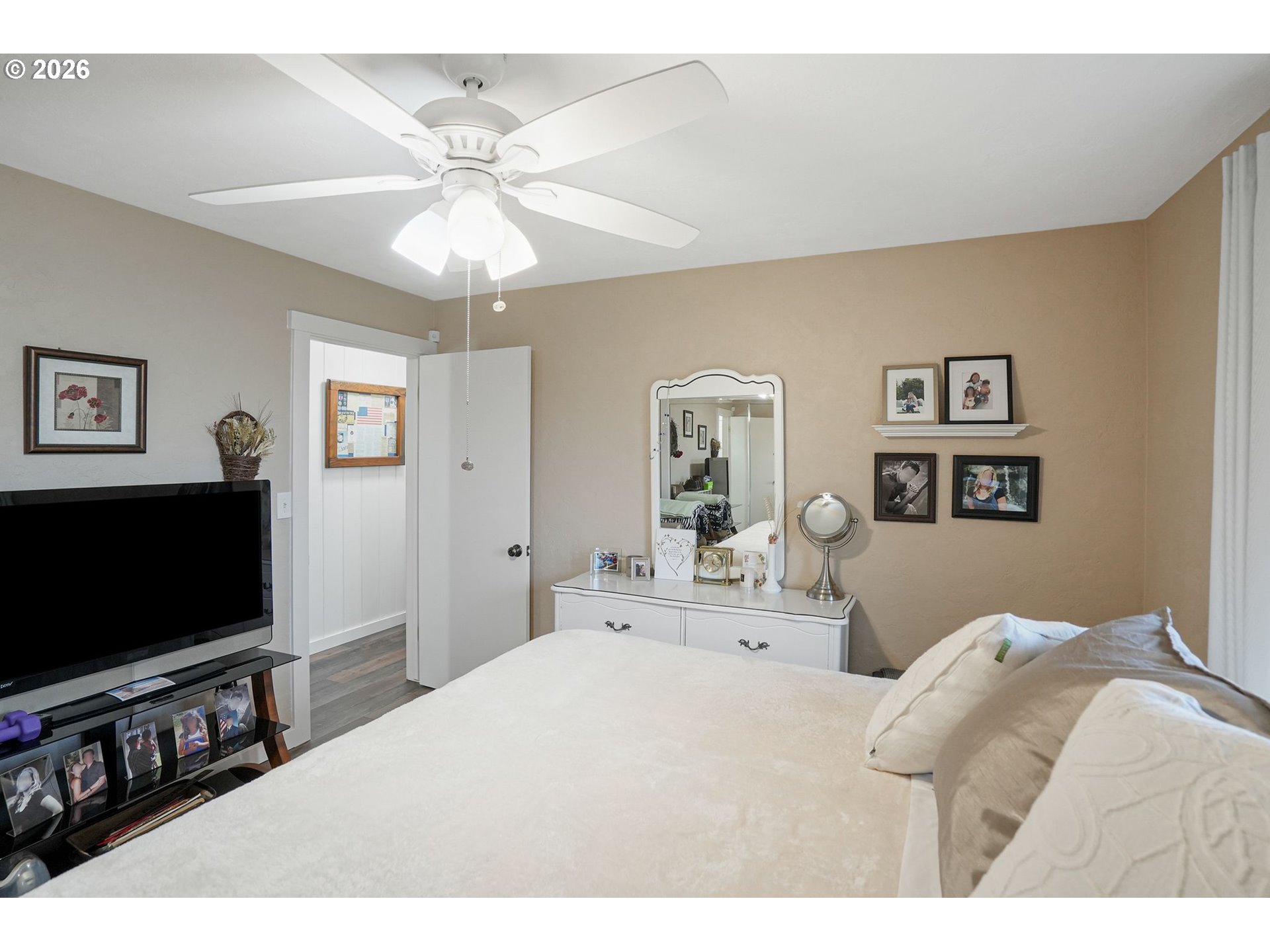 30596 Horseshoe Drive Southwest Albany, OR 97321 - Photo 21 of 43 a bedroom with a bed and a flat screen tv