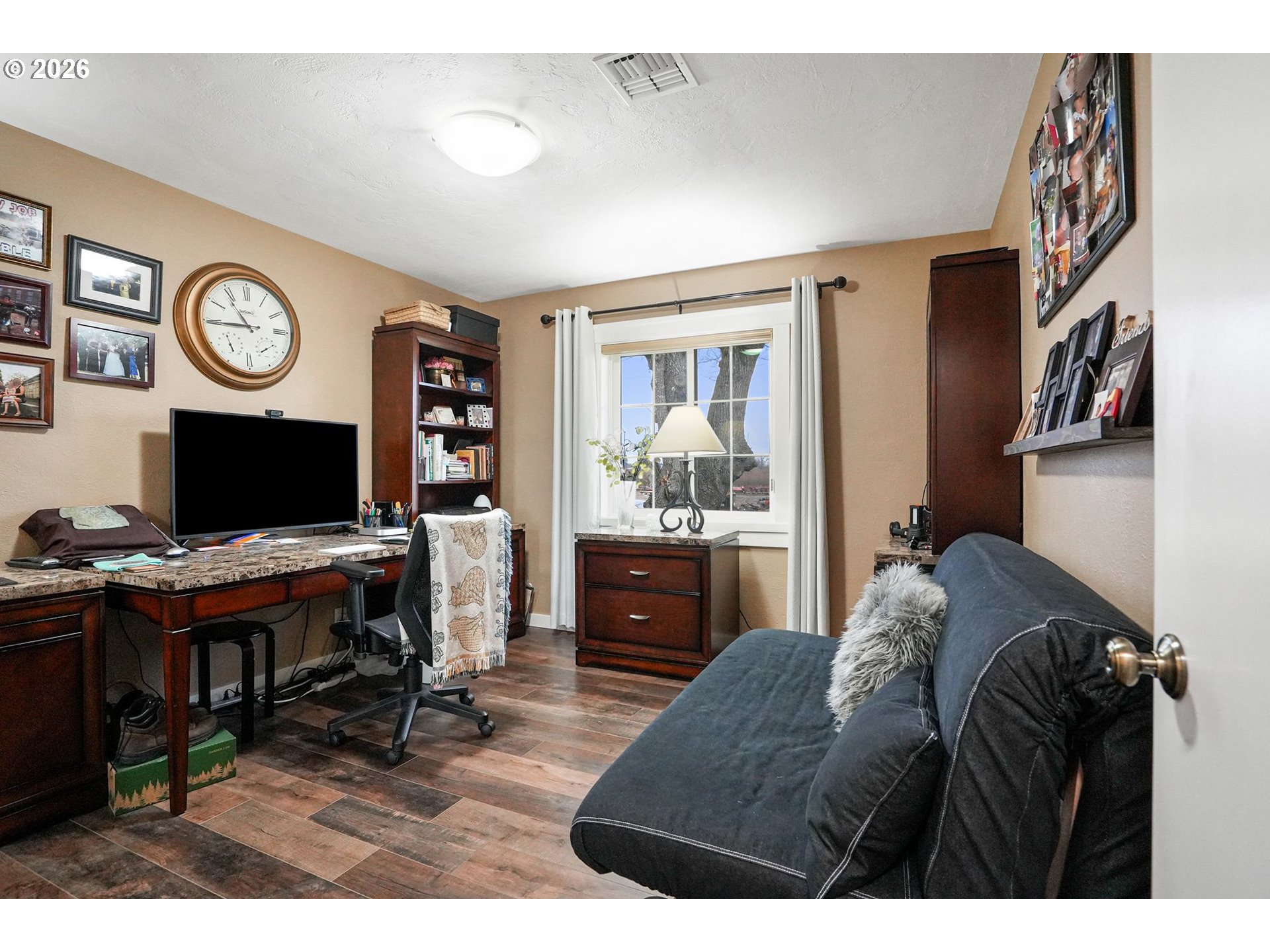 30596 Horseshoe Drive Southwest Albany, OR 97321 - Photo 22 of 43 a bedroom with a bed and a television