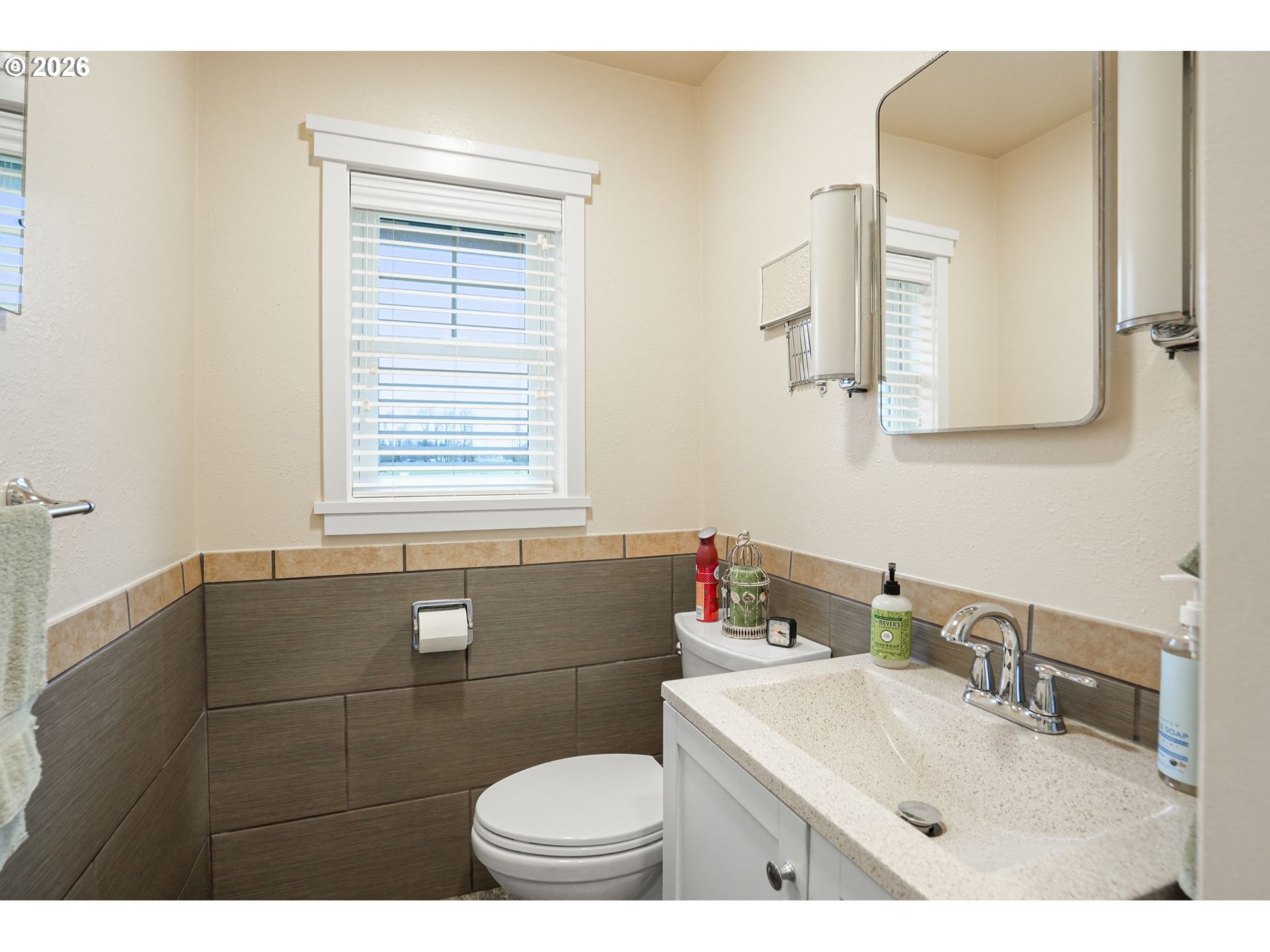 30596 Horseshoe Drive Southwest Albany, OR 97321 - Photo 26 of 43 a bathroom with a sink toilet and mirror