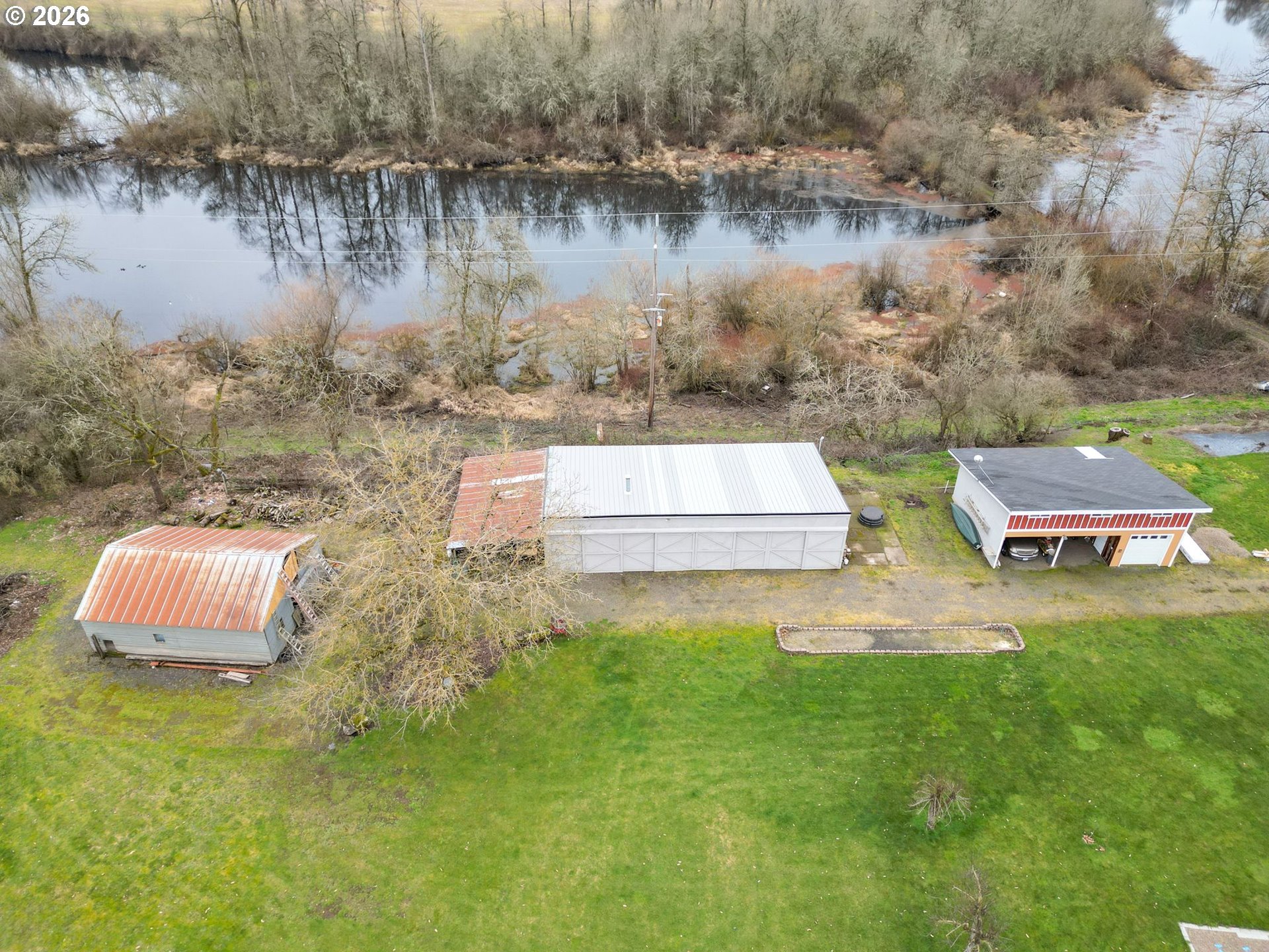 30596 Horseshoe Drive Southwest Albany, OR 97321 - Photo 34 of 43 a aerial view of a house with swimming pool and lake view