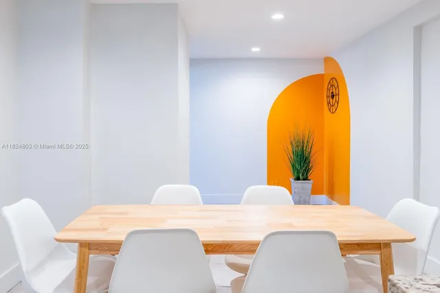 a view of a dining room with furniture