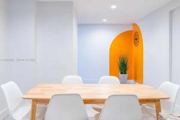 a view of a dining room with furniture