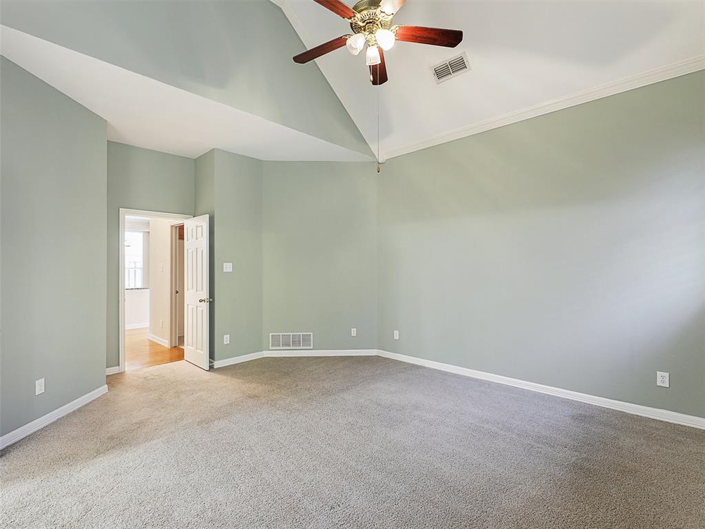 4620 Portrait Lane Plano, TX 75024 - Photo 15 of 25 an empty room with windows and fan