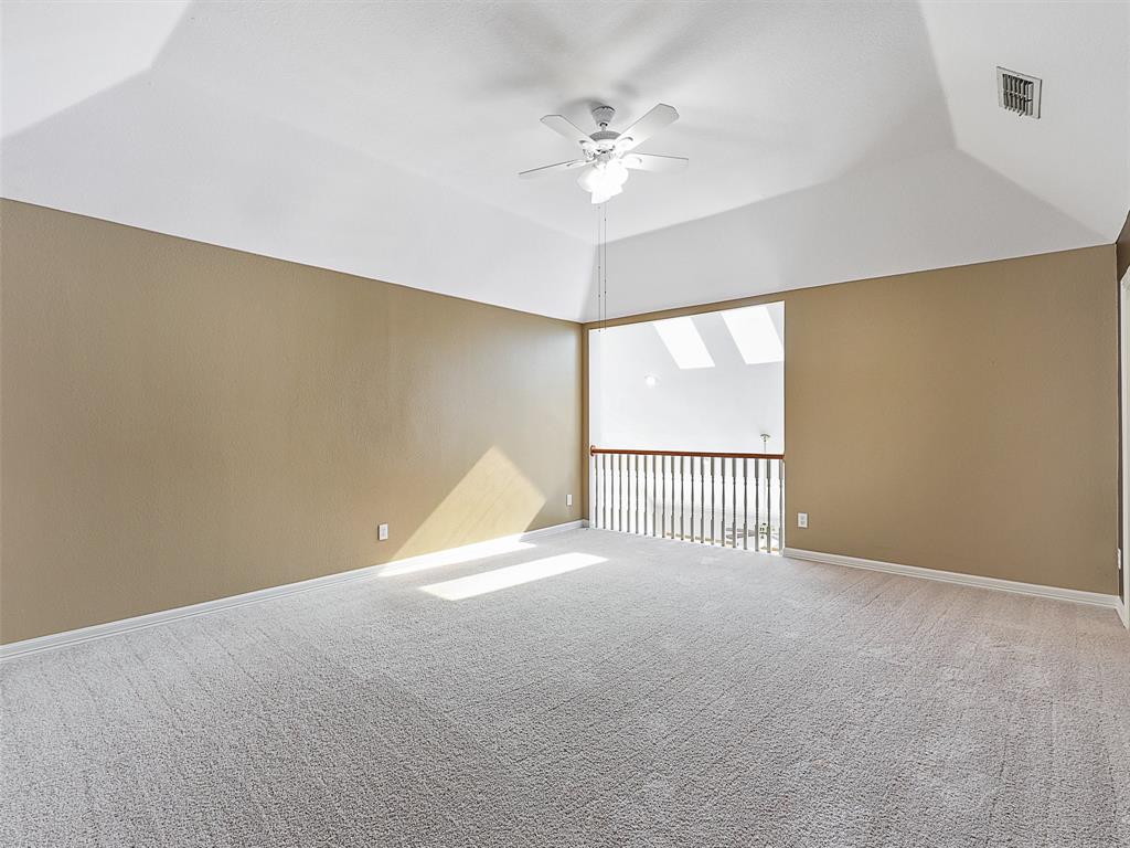 4620 Portrait Lane Plano, TX 75024 - Photo 23 of 25 a view of an empty room with a window