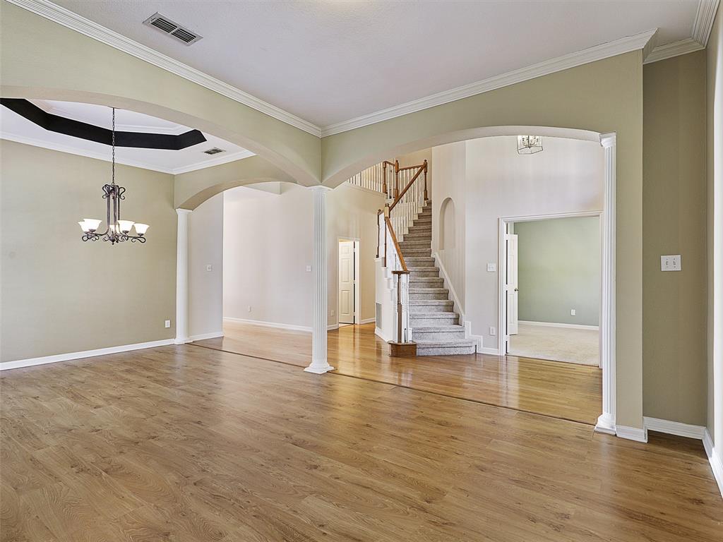 4620 Portrait Lane Plano, TX 75024 - Photo 7 of 25 a view of empty room with wooden floor