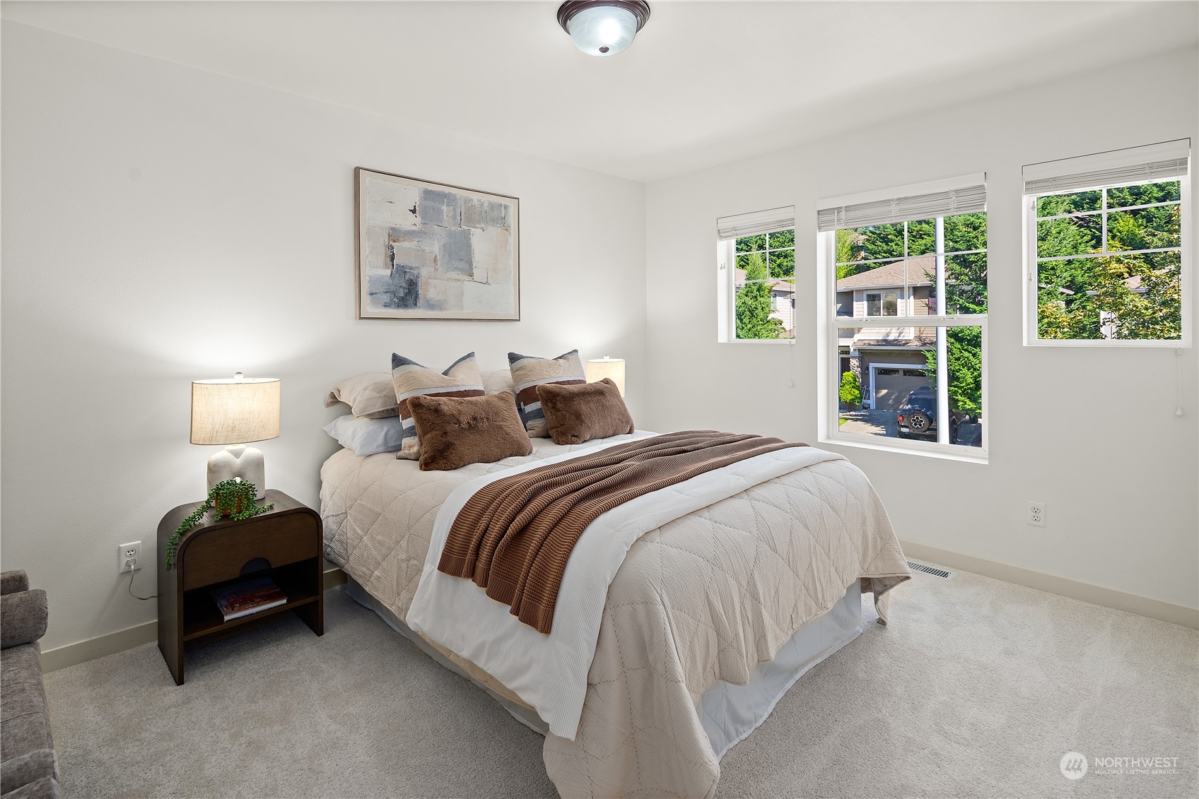 22920 36th Avenue Southeast Bothell, WA 98021 - Photo 19 of 30 a bedroom with bed and a window