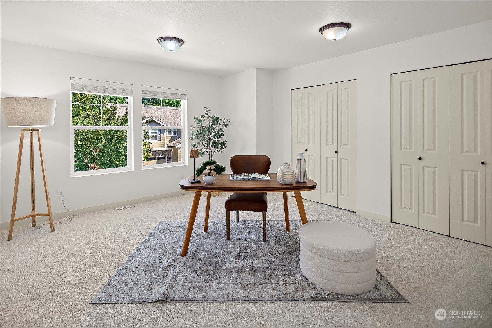 22920 36th Avenue Southeast Bothell, WA 98021 - Photo 21 of 30 a room with furniture and a window