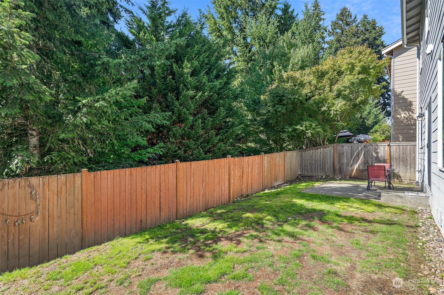 22920 36th Avenue Southeast Bothell, WA 98021 - Photo 28 of 30 a view of a backyard with wooden fence