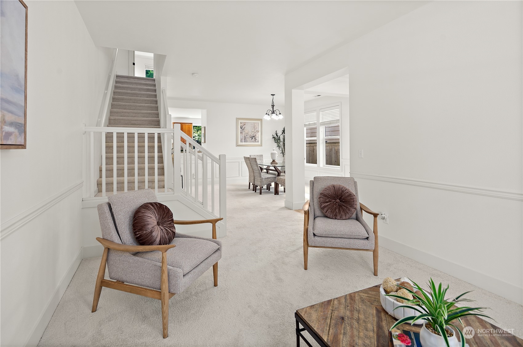 22920 36th Avenue Southeast Bothell, WA 98021 - Photo 6 of 30 a bedroom with furniture and a chair