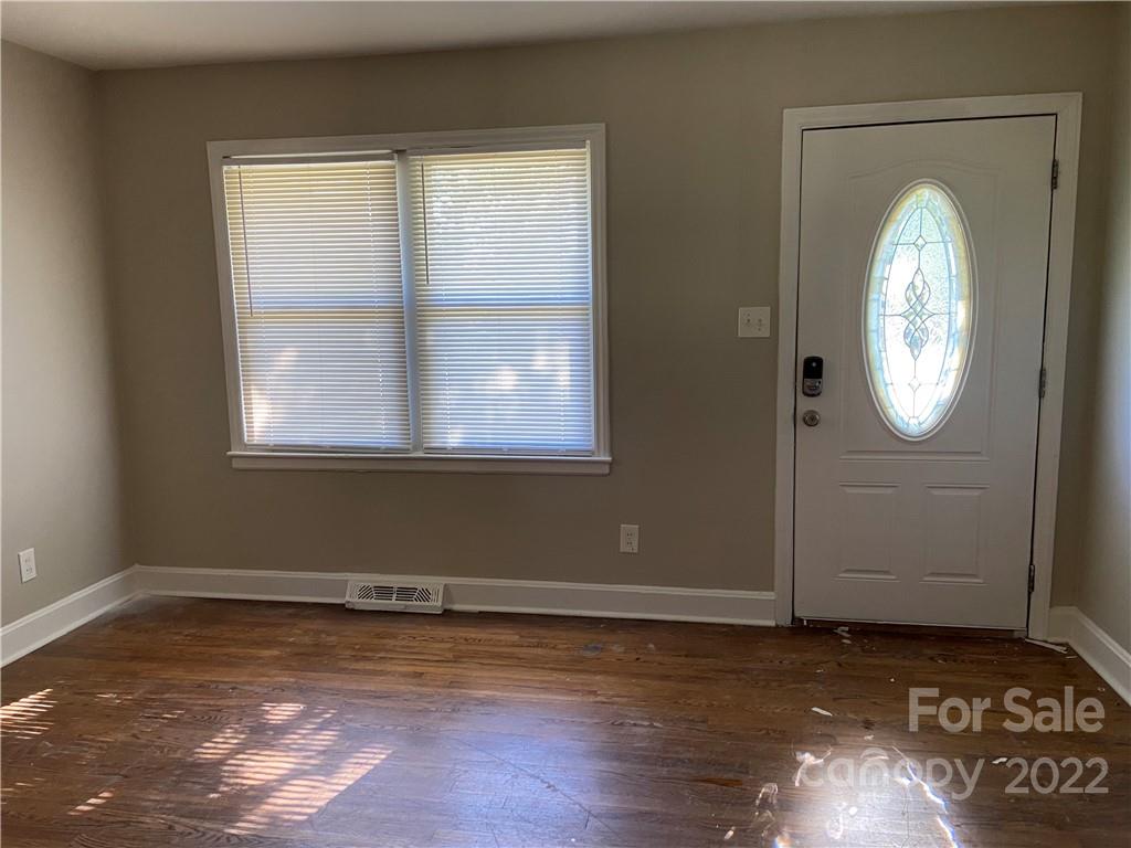 4518 Ridgeley Drive Charlotte, NC 28208 - Photo 5 of 18 an empty room with a window