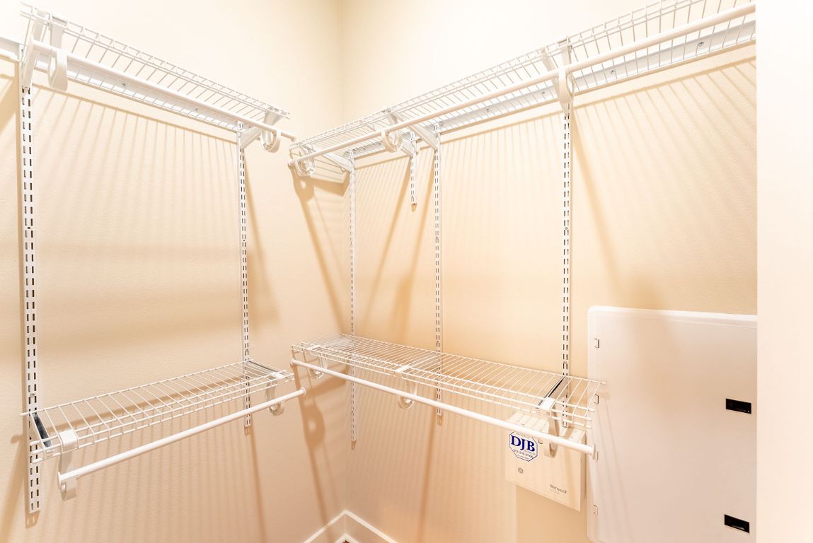 1702 South Lamar Boulevard, Unit 27 Austin, TX 78704 - Photo 18 of 20 View of walk in closet