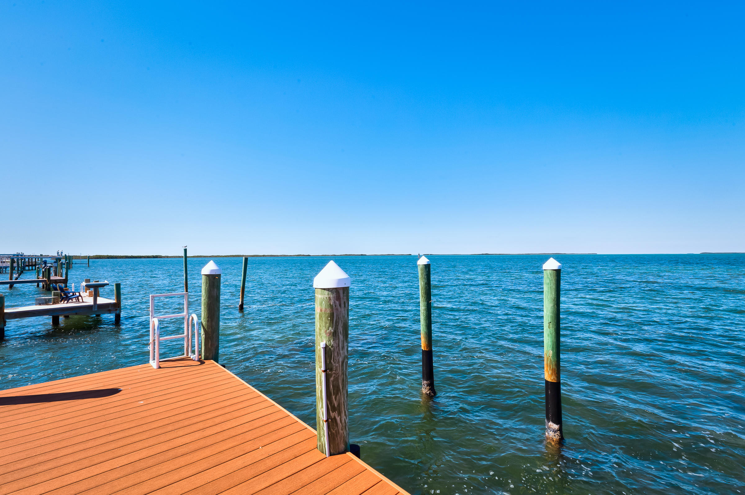 79 Mutiny Place Key Largo, FL 33037 - Photo 2 of 44 Dock on the Bay