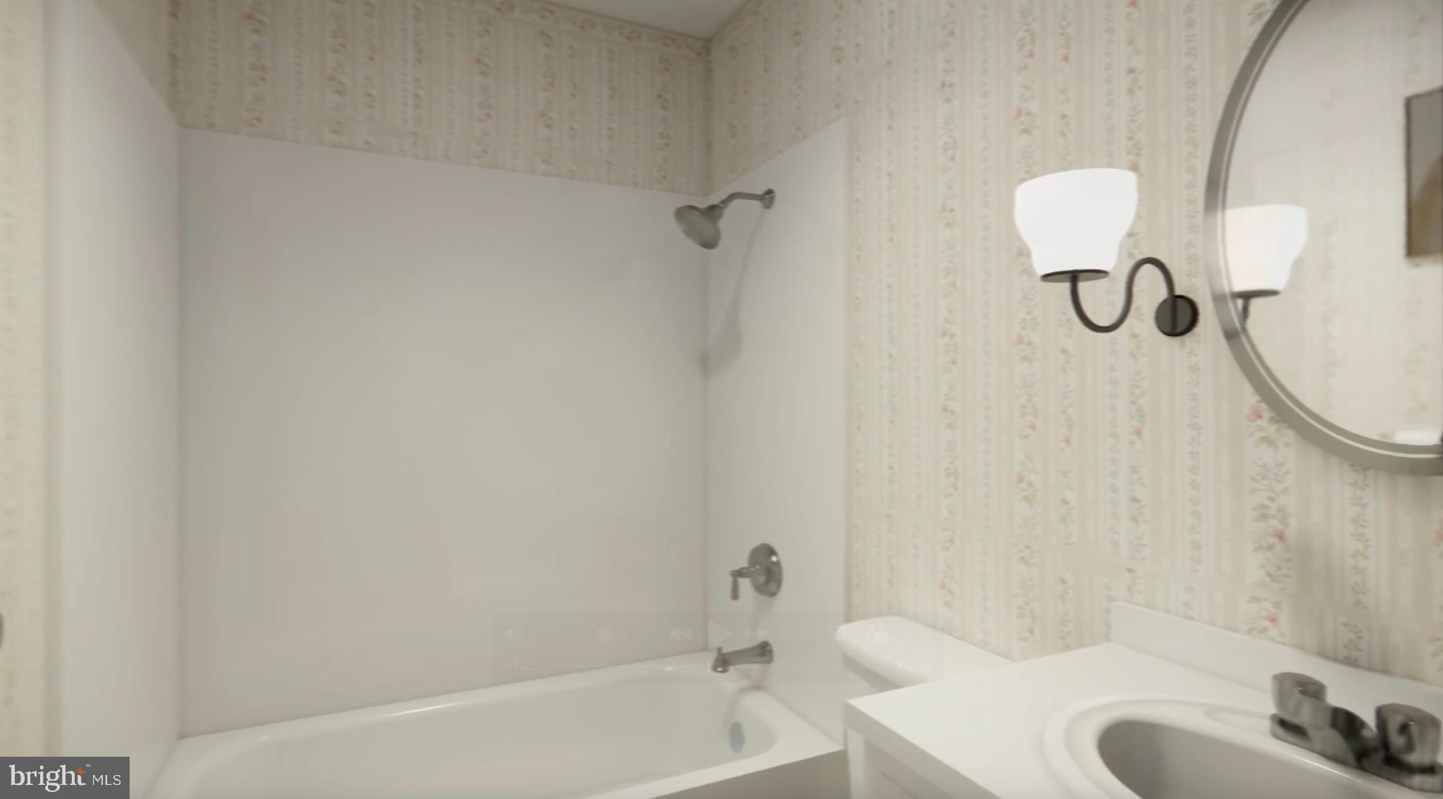 7300 Roselynn Lane Clinton, MD 20735 - Photo 17 of 28 a bathroom with a granite countertop bathtub and a sink