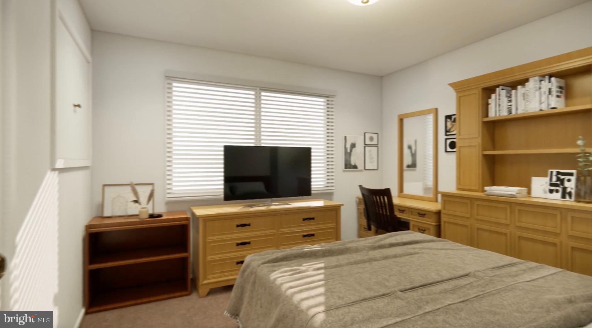 7300 Roselynn Lane Clinton, MD 20735 - Photo 18 of 28 a bedroom with a bed and a flat screen tv