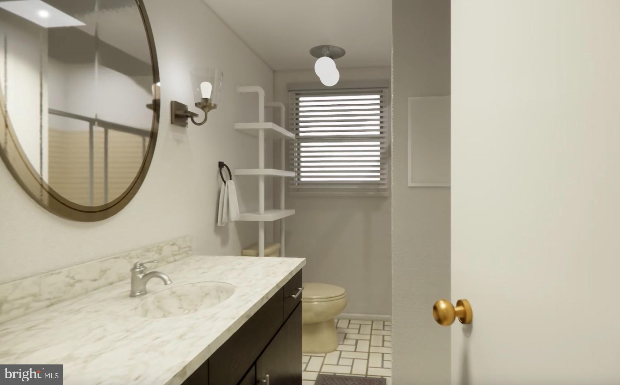 7300 Roselynn Lane Clinton, MD 20735 - Photo 27 of 28 a bathroom with a sink and a mirror