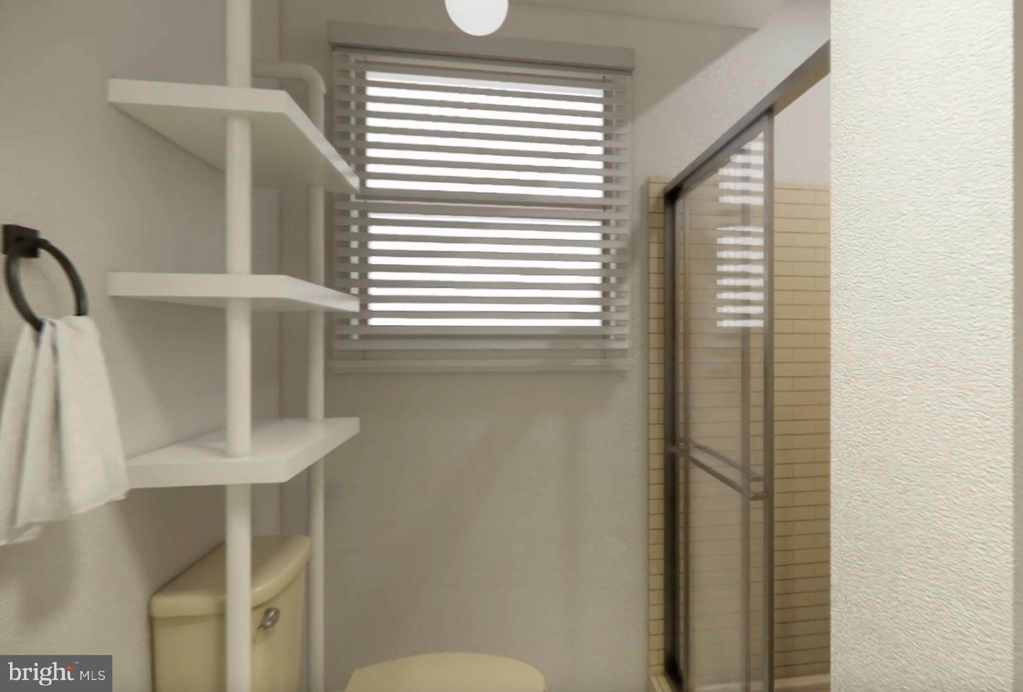 7300 Roselynn Lane Clinton, MD 20735 - Photo 28 of 28 a bathroom with a toilet and a sink