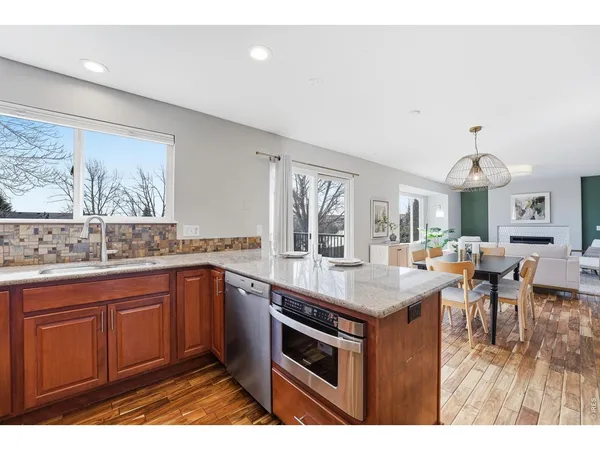 a kitchen with a stove and cabinets