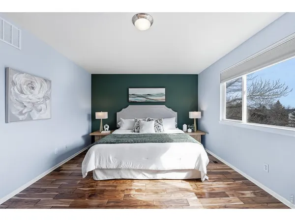 a large white bed in a room