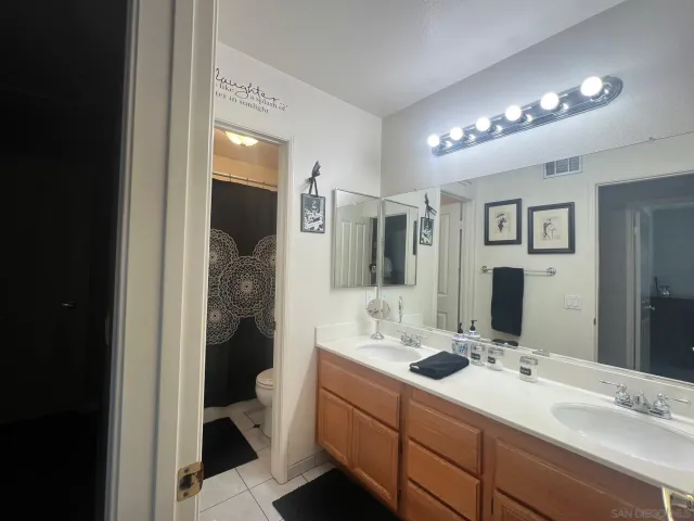 a white refrigerator freezer sitting inside of a kitchen