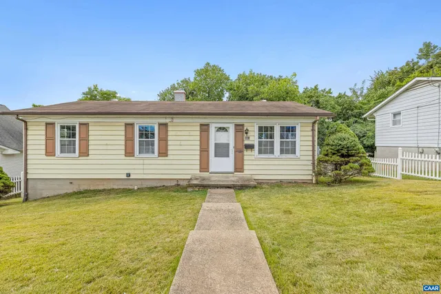 a view of a house with a swimming pool
