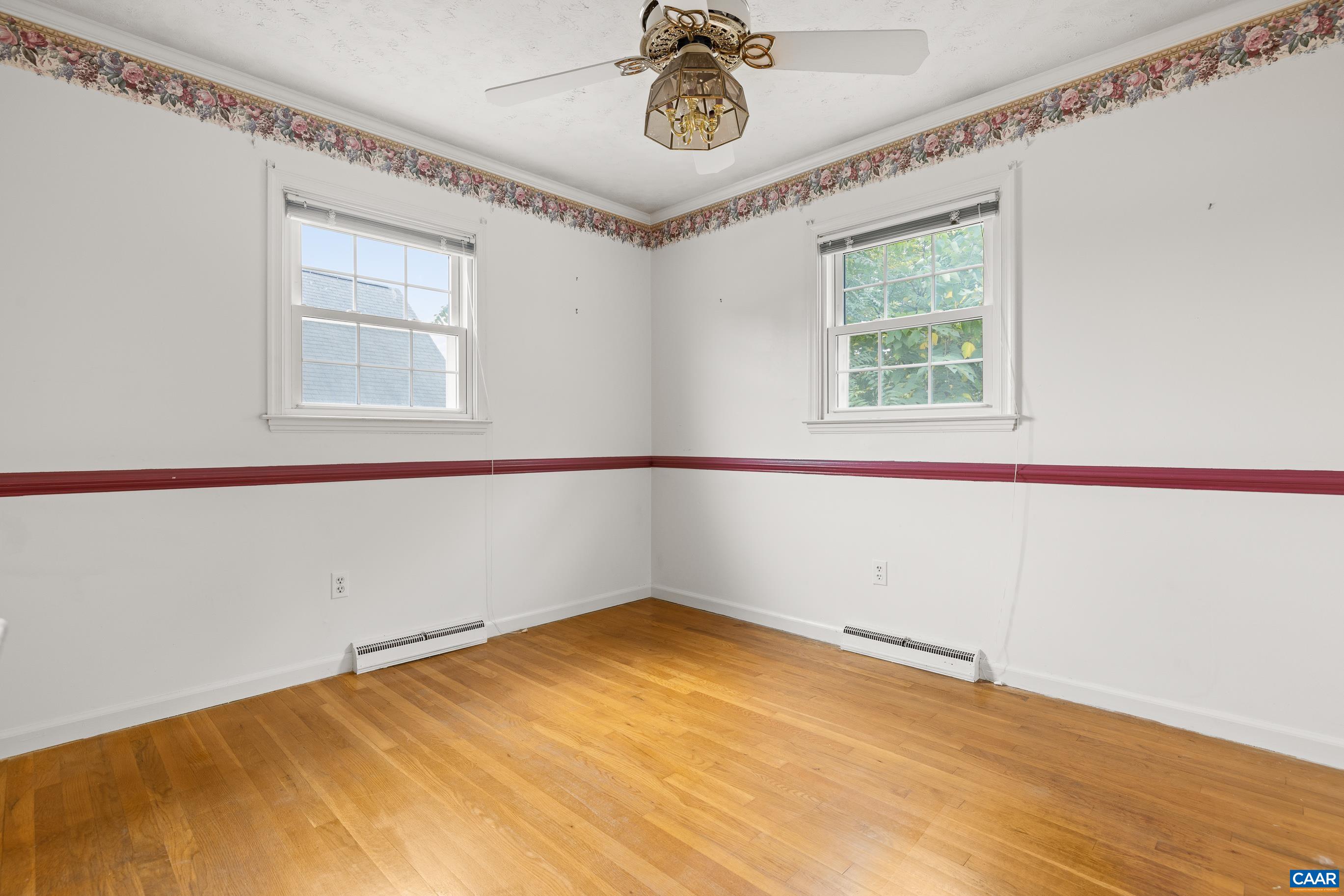408 Carlton Road Charlottesville, VA 22902 - Photo 15 of 28 a view of a room with wooden floor and windows