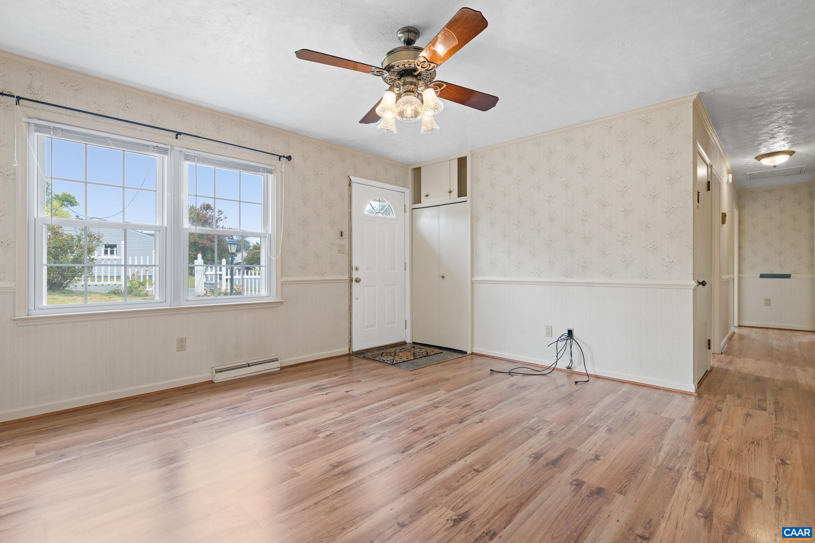 408 Carlton Road Charlottesville, VA 22902 - Photo 8 of 28 wooden floor in an empty room with a window