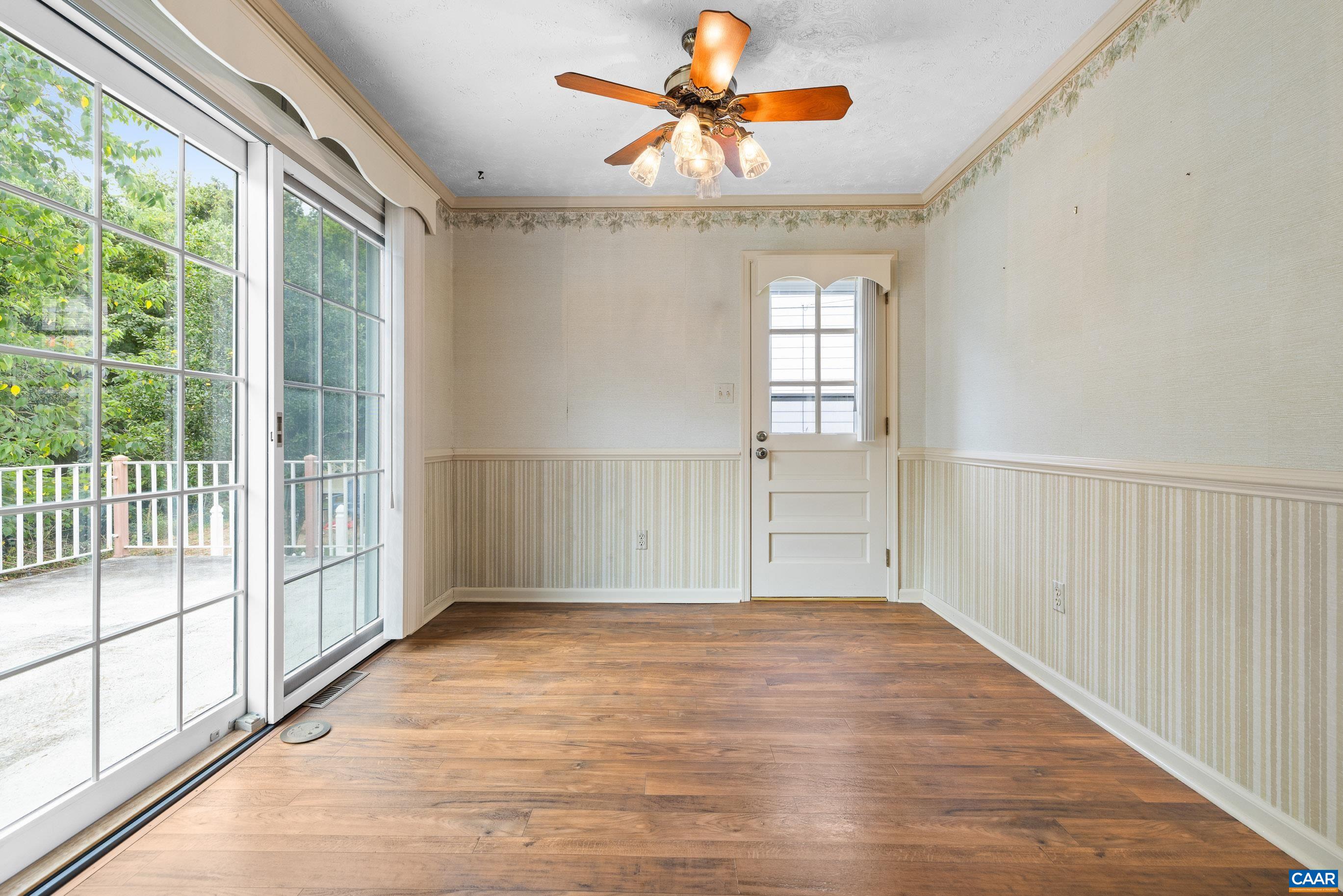 408 Carlton Road Charlottesville, VA 22902 - Photo 10 of 28 a view of a livingroom with a ceiling fan and window
