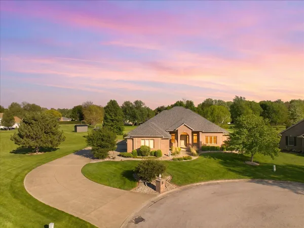 a house view with a garden space