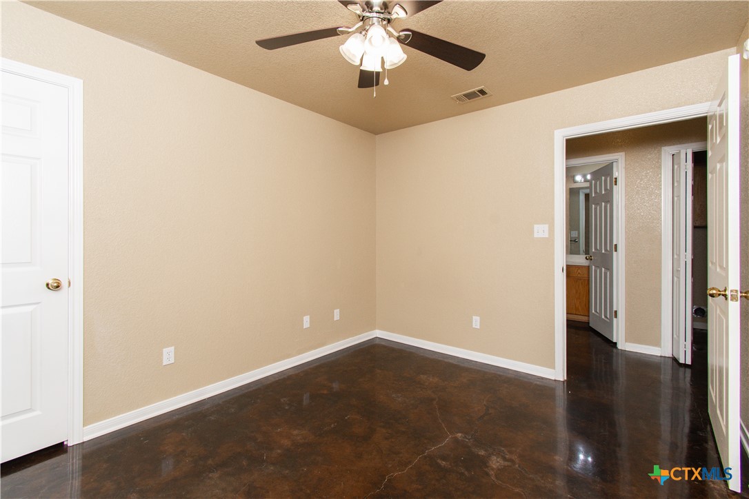 1611 Ute Trail, Unit A Harker Heights, TX 76548 - Photo 13 of 20 a view of an empty room with window and wooden floor