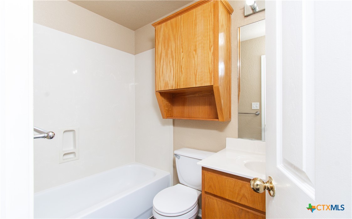 1611 Ute Trail, Unit A Harker Heights, TX 76548 - Photo 15 of 20 a bathroom with a bathtub and sink