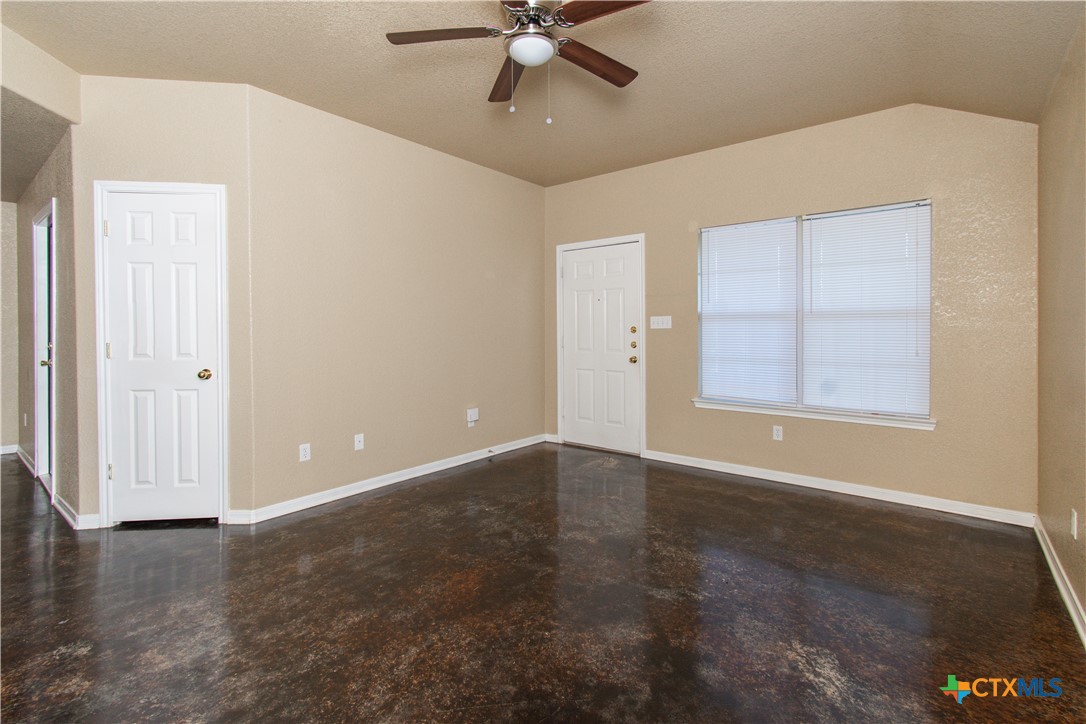 1611 Ute Trail, Unit A Harker Heights, TX 76548 - Photo 4 of 20 an empty room with windows and fan