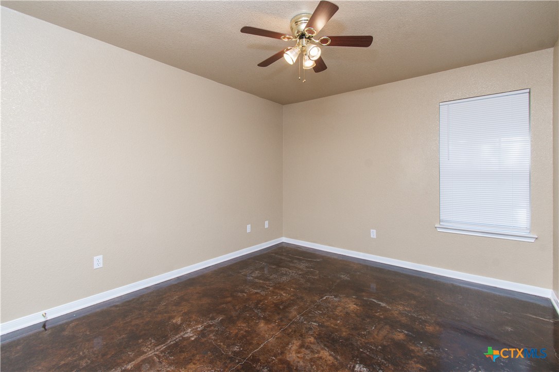 1611 Ute Trail, Unit A Harker Heights, TX 76548 - Photo 8 of 20 an empty room with windows and fan