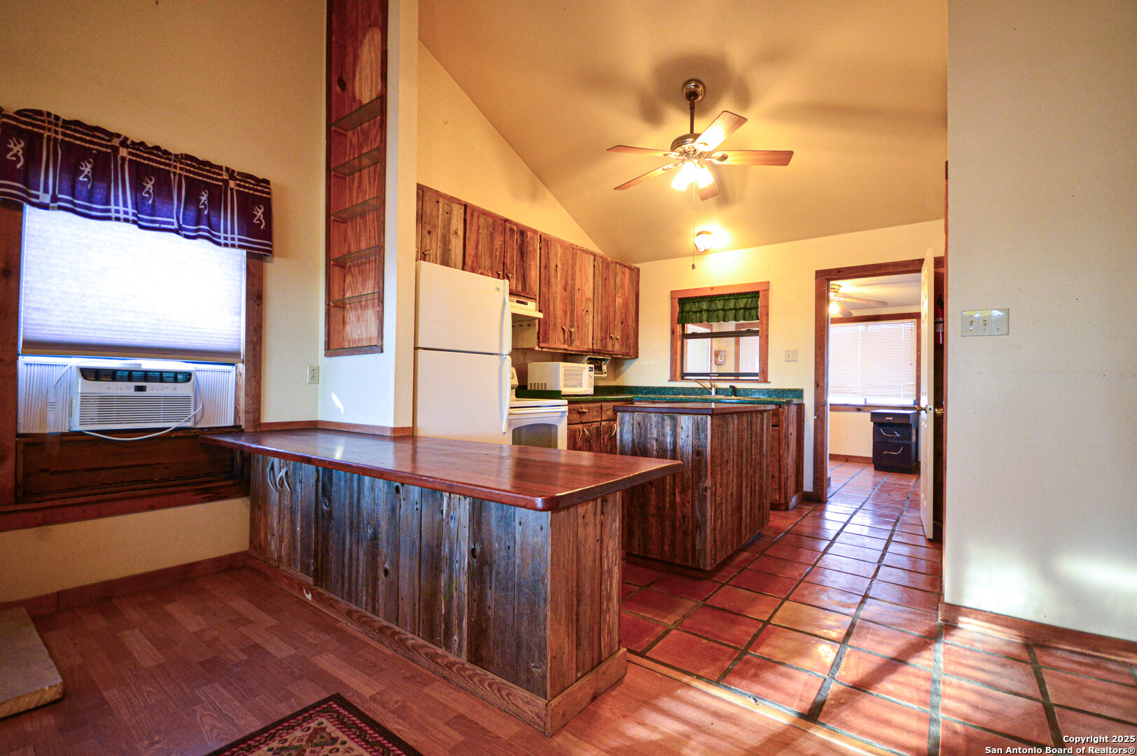 3527 Stapp Ranch Road Harper, TX 78631 - Photo 15 of 49 a kitchen with stainless steel appliances granite countertop a refrigerator and a sink