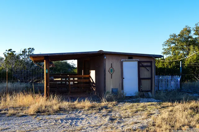 a view of outdoor space and backyard