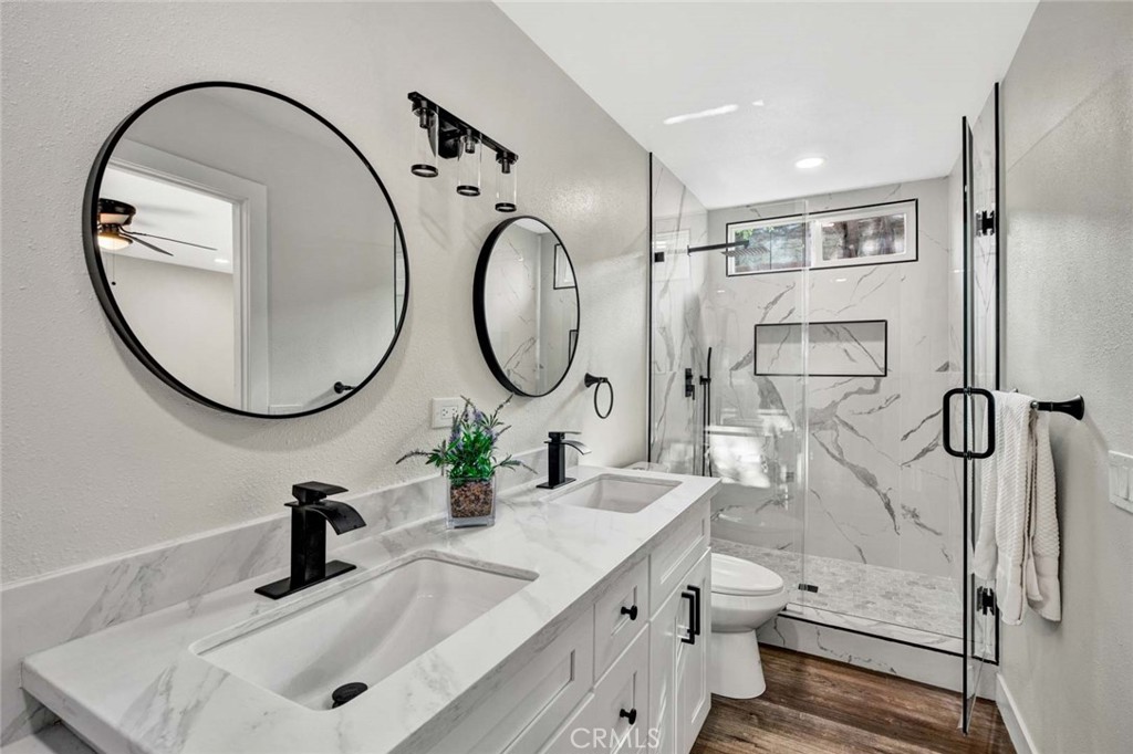 1798 Moorpark Drive Brea, CA 92821 - Photo 19 of 71 a bathroom with a sink double vanity and a mirror