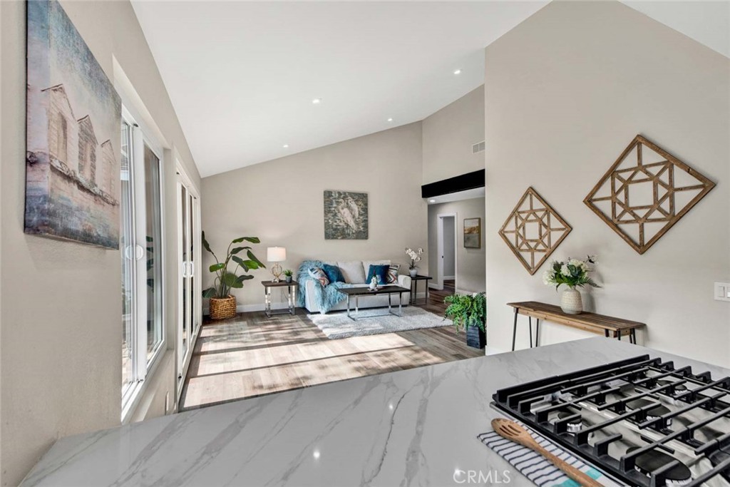 1798 Moorpark Drive Brea, CA 92821 - Photo 24 of 71 a living room with furniture and a rug