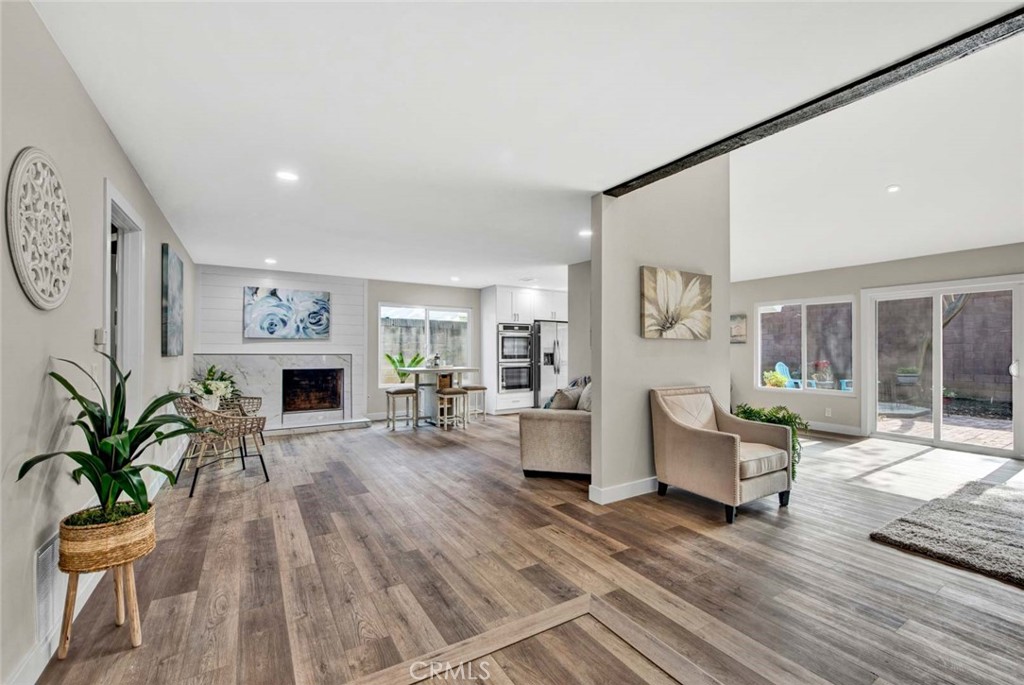 1798 Moorpark Drive Brea, CA 92821 - Photo 27 of 71 a living room with furniture and a fireplace