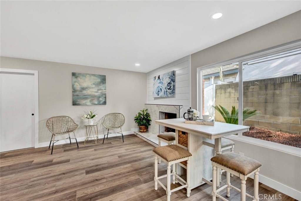 1798 Moorpark Drive Brea, CA 92821 - Photo 37 of 71 a workspace with furniture window and wooden floor