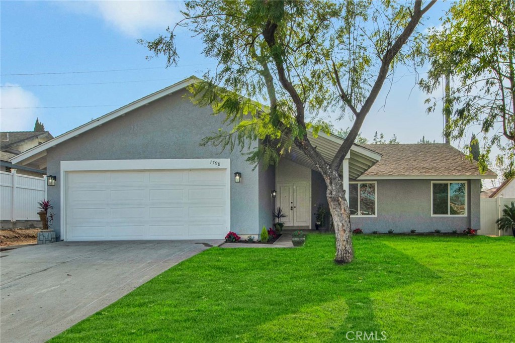 1798 Moorpark Drive Brea, CA 92821 - Photo 42 of 71 a front view of house with yard