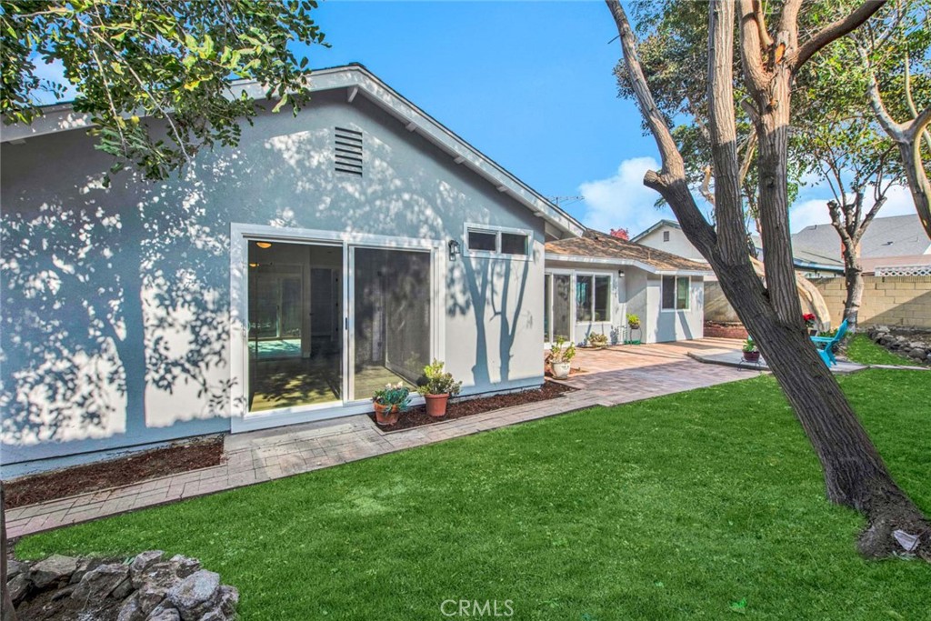 1798 Moorpark Drive Brea, CA 92821 - Photo 46 of 71 a front view of a house with a yard and porch