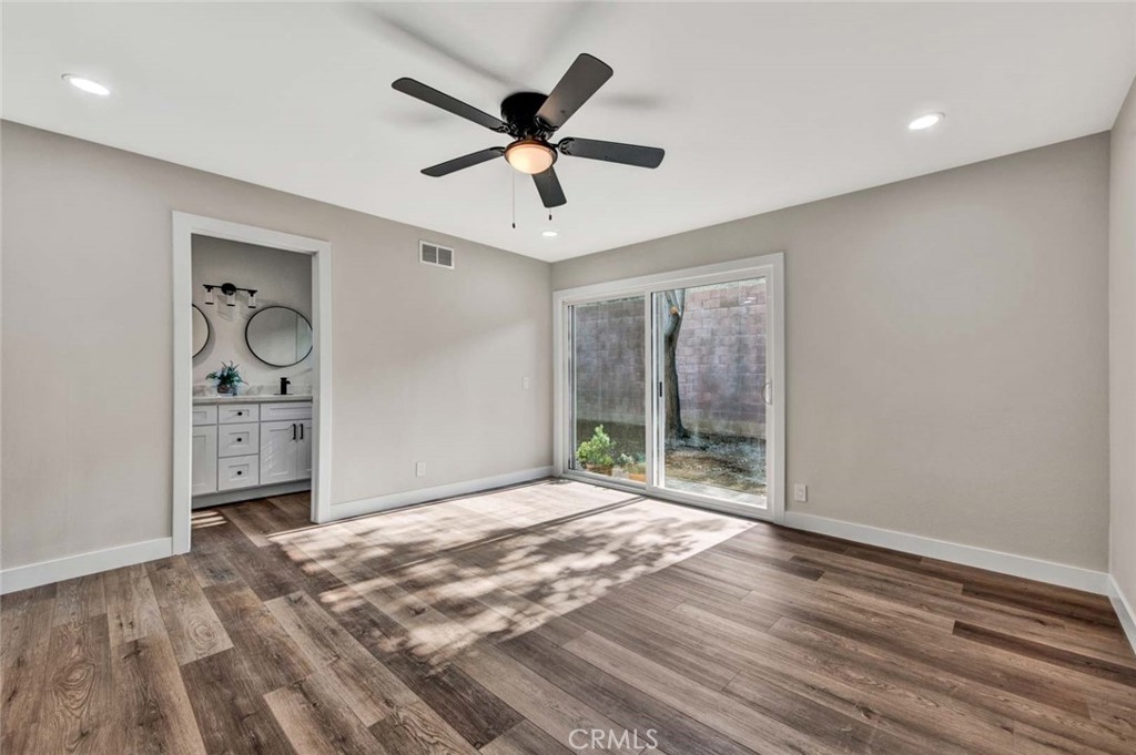 1798 Moorpark Drive Brea, CA 92821 - Photo 56 of 71 a view of a livingroom with a window and wooden floor