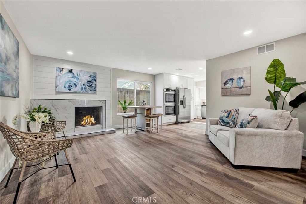 1798 Moorpark Drive Brea, CA 92821 - Photo 6 of 71 a living room with furniture and a fireplace